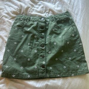 Green skirt with white flowers